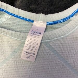light blue ivviva shirt